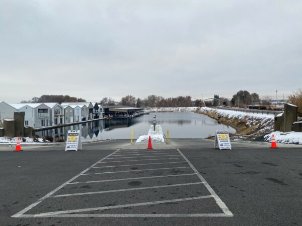 Clover Island Boat Launch with closed until further notice sandwich board signs in place.
