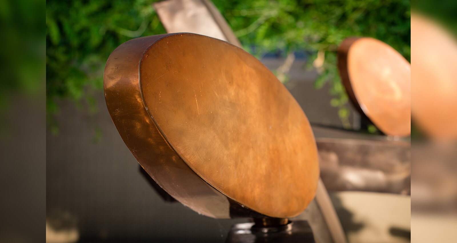 Close up of the Family Group artwork's brushed steel and copper structure.